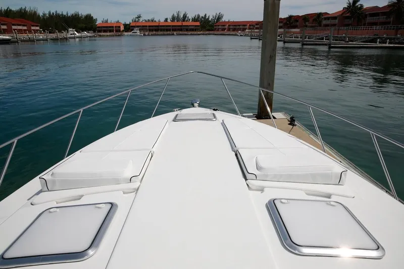 Slide: The Image of 2019 Formula 37 Performance Cruiser bow view at marina. - 18