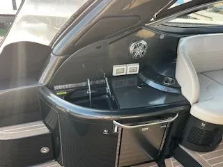 Slide: The Image of 2018 Formula 37 Performance Cruiser interior with kitchenette and seating area. - 3