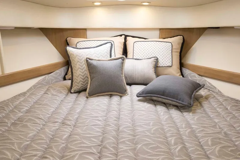 Slide: The Image of Luxurious bed in 2019 Formula 37 Performance Cruiser with decorative pillows. - 30