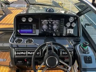 Slide: The Image of 2018 Formula 37 Performance Cruiser dashboard with advanced navigation and control systems. - 6