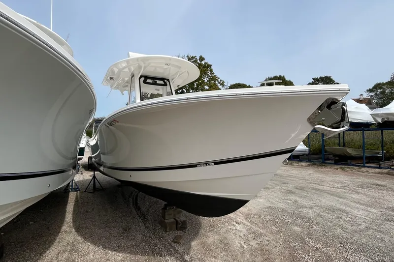 Slide: The Image of 2023 Regulator 28 boat on display, showcasing sleek design and modern features. - 2