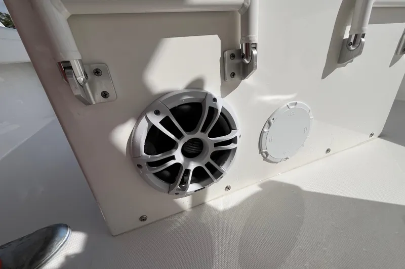 Slide: The Image of 2023 Regulator 28 boat interior with speaker and hatch detail. - 39