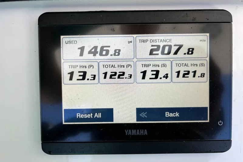 Slide: The Image of Yamaha display showing fuel usage, trip distance, and hours for 2023 Regulator 28 boat. - 57
