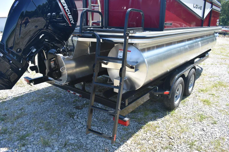 Slide: The Image of 2025 Lowe LS 210 WT pontoon boat on trailer with Mercury outboard motor. - 14