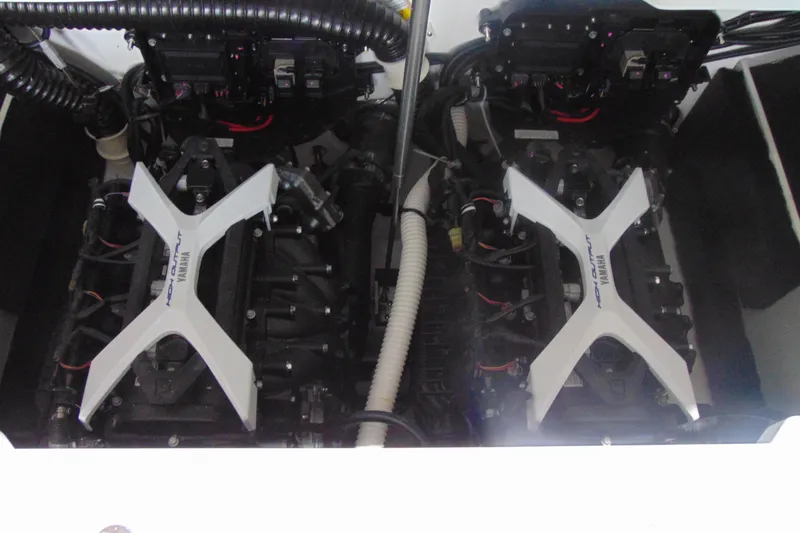 Slide: The Image of 2026 Yamaha Boats 222SE engine compartment with dual high-output engines. - 10