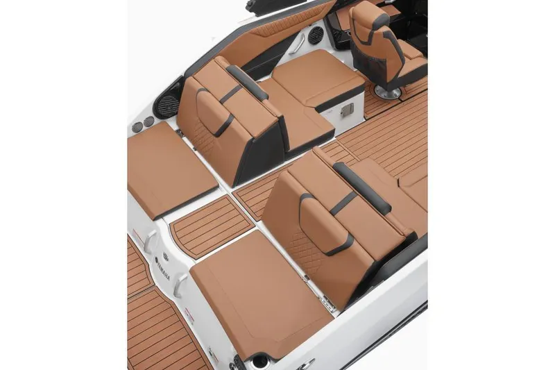 Slide: The Image of 2026 Yamaha Boats 222SE interior with luxurious tan seating and sleek design. - 7