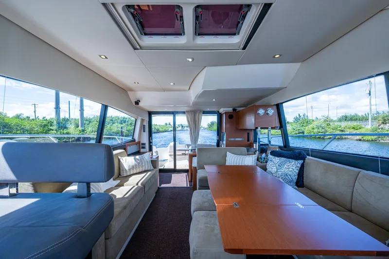 Slide: The Image of Luxurious 2012 Prestige Flybridge yacht interior with spacious seating and elegant design. - 49