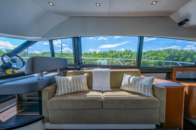 Slide: The Image of Luxurious interior of 2012 Prestige Flybridge yacht with scenic window views. - 53