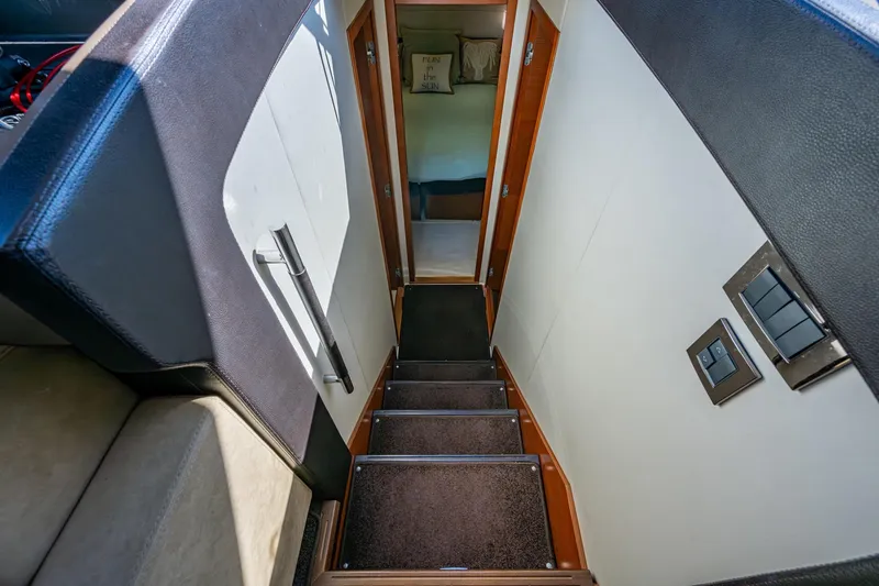 Slide: The Image of Staircase leading to cabin interior of 2012 Prestige Flybridge yacht. - 70