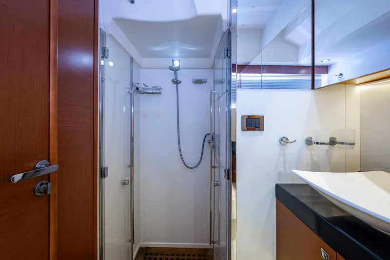 Slide: The Image of Luxurious bathroom interior of 2012 Prestige Flybridge yacht with modern shower and sink. - 74
