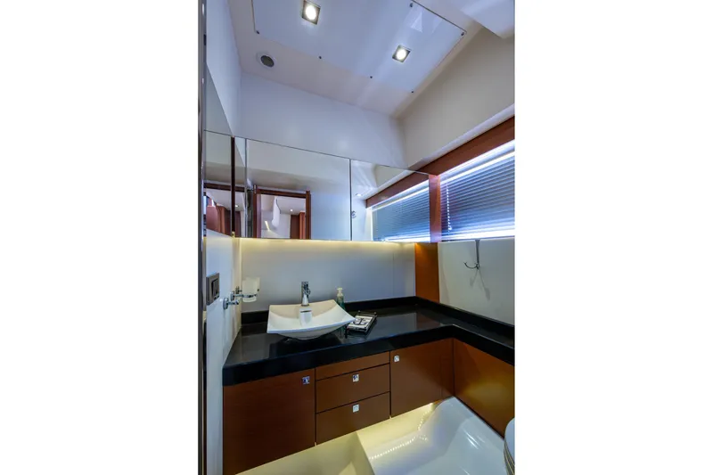 Slide: The Image of Luxurious bathroom in 2012 Prestige Flybridge yacht with modern fixtures and sleek design. - 76