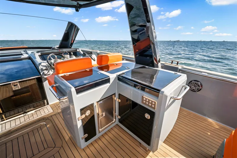 Slide: The Image of Luxurious 2019 Fjord 52 Open yacht interior with modern kitchen and ocean view. - 10