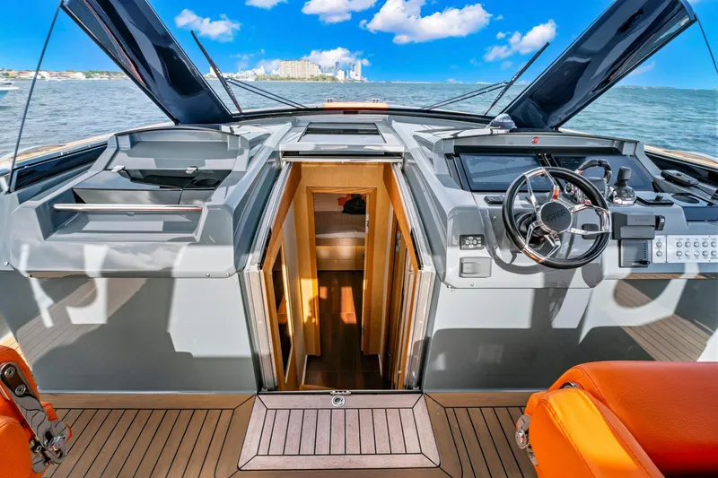 Slide: The Image of 2019 Fjord 52 Open yacht cockpit with modern steering and ocean view. - 14