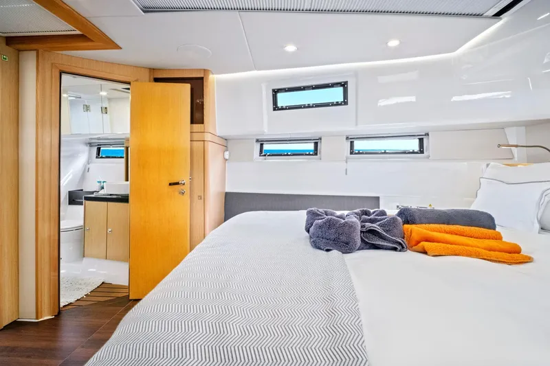 Slide: The Image of Luxurious interior of 2019 Fjord 52 Open yacht with cozy bedroom and modern bathroom. - 21