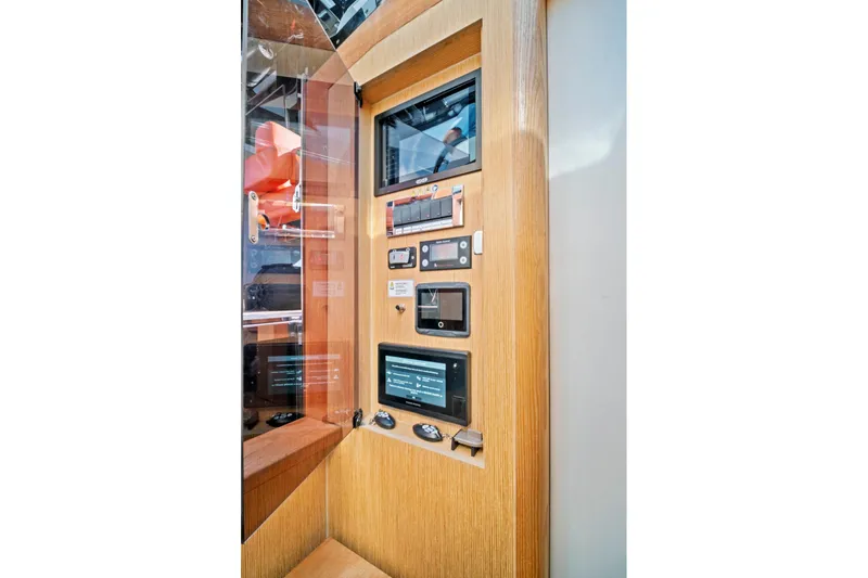 Slide: The Image of Control panel of 2019 Fjord 52 Open yacht with modern navigation equipment. - 27