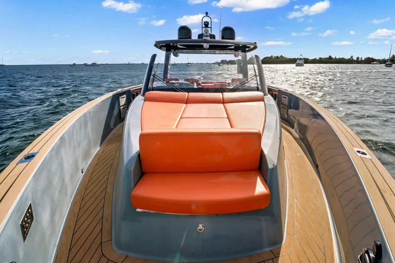 Slide: The Image of 2019 Fjord 52 Open yacht with orange seating, cruising on a sunny day. - 9