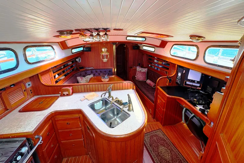 Slide: The Image of Luxurious 1987 Hans Christian Cristina 40 yacht interior with wood finish and modern amenities. - 10