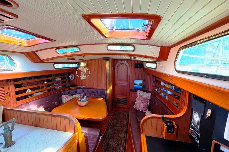 Slide: The Image of Luxurious 1987 Hans Christian Cristina 40 yacht interior with wood finish and skylights. - 7