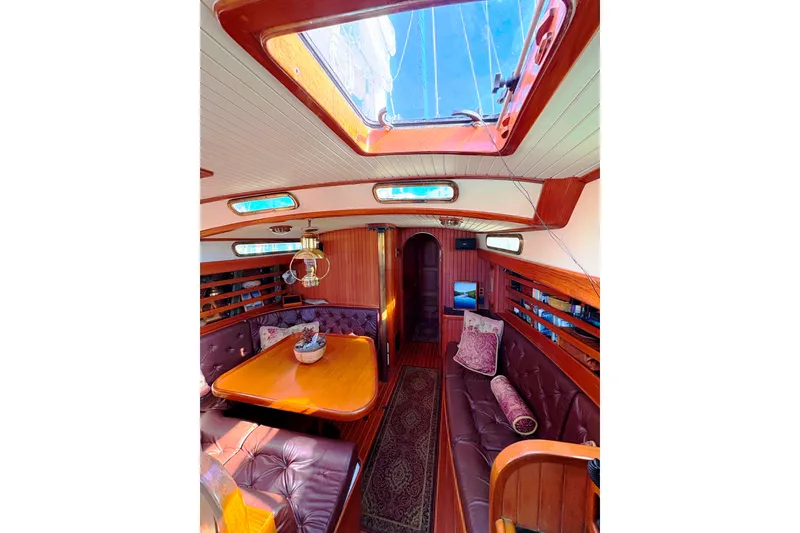 Slide: The Image of Luxurious 1987 Hans Christian Cristina 40 yacht interior with wood finish and skylight. - 8
