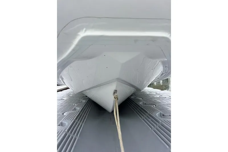 Slide: The Image of Underneath view of 2023 Novurania Como 18 boat on a dock. - 13