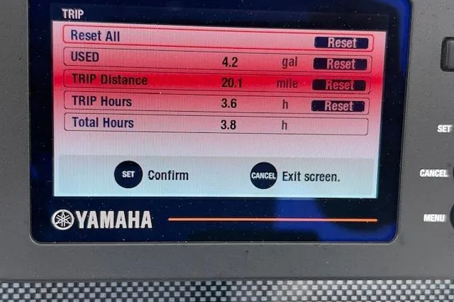 Slide: The Image of Yamaha display showing trip data: 4.2 gallons used, 20.1 miles traveled, 3.6 trip hours. Novurania Como 18, 2023. - 18