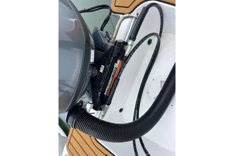 Slide: The Image of Close-up of 2023 Novurania Como 18 boat engine components and hydraulic system. - 19