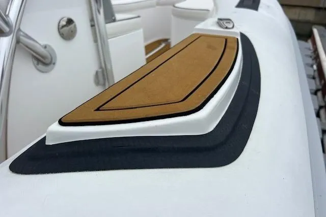 Slide: The Image of 2023 Novurania Como 18 boat detail with sleek design and modern features. - 8