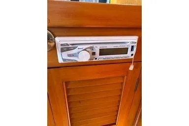 Slide: The Image of 2001 Logan 33 stereo system mounted on wooden panel. - 15