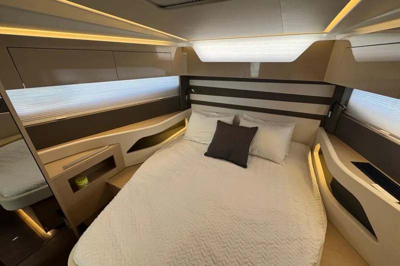 Slide: The Image of Luxurious interior cabin of 2024 Jeanneau DB43 yacht with modern design and cozy bedding. - 27