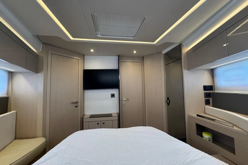Slide: The Image of Luxurious interior of 2024 Jeanneau DB43 yacht cabin with modern design and ambient lighting. - 28