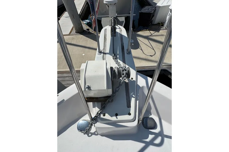 Slide: The Image of 1985 Carver 3607 Aft Cabin Motor Yacht anchor chain and winch on deck. - 16