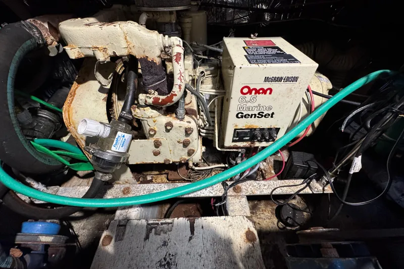 Slide: The Image of Engine room of 1985 Carver 3607 Aft Cabin Motor Yacht with Onan 6.5 Marine GenSet. - 91