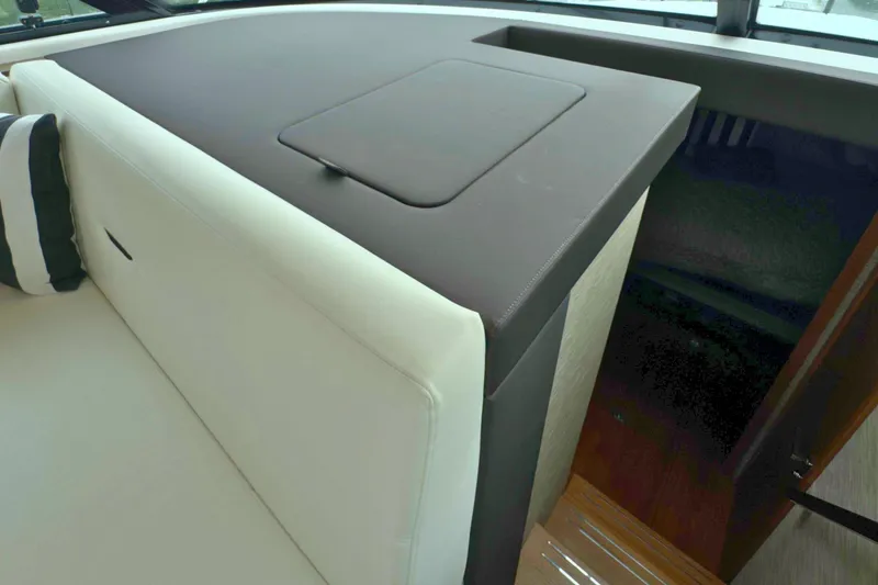 Slide: The Image of 2018 Tiara Yachts C44 Coupe interior with sleek seating and modern design. - 36