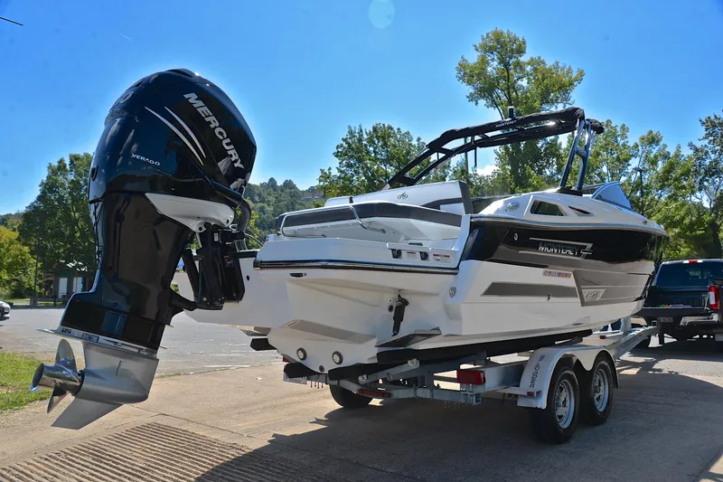 Slide: The Image of 2023 Monterey 275SS Super Sport boat on trailer with Mercury outboard engine. - 14