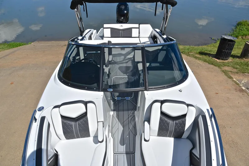 Slide: The Image of 2023 Monterey 275SS Super Sport boat with sleek design and luxurious seating. - 20