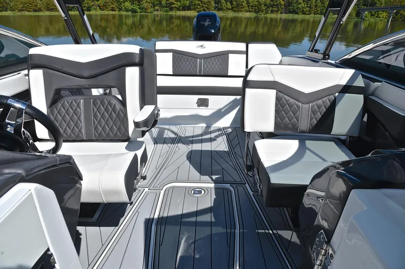 Slide: The Image of 2023 Monterey 275SS Super Sport boat interior with luxurious seating and modern design. - 22
