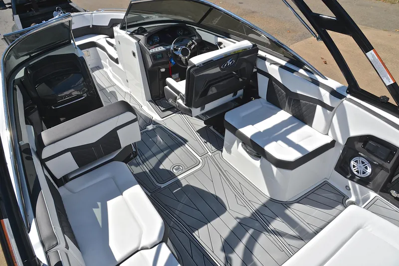Slide: The Image of 2023 Monterey 275SS Super Sport boat interior with modern seating and sleek design. - 24