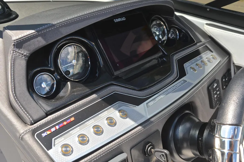 Slide: The Image of Dashboard of 2023 Monterey 275SS Super Sport boat with gauges and controls. - 27