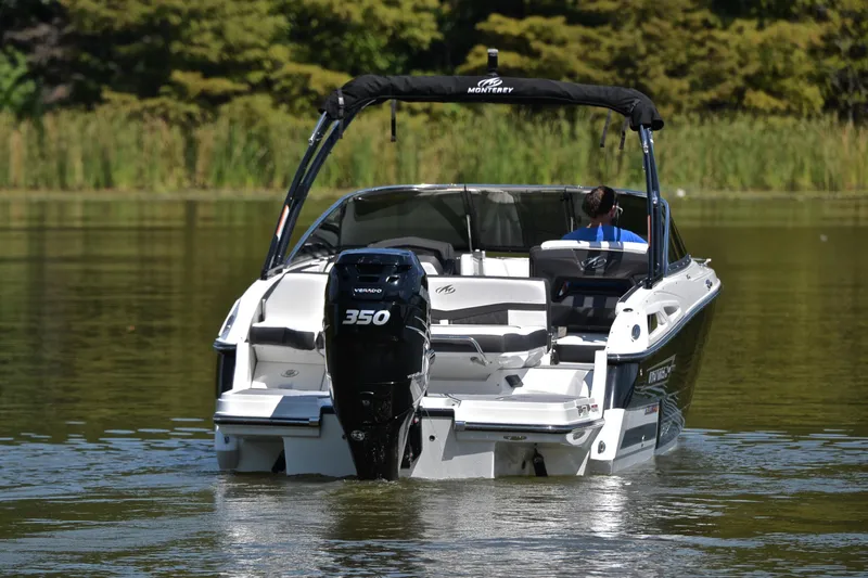 Slide: The Image of 2023 Monterey 275SS Super Sport boat on calm water, rear view with Verado 350 engine. - 9