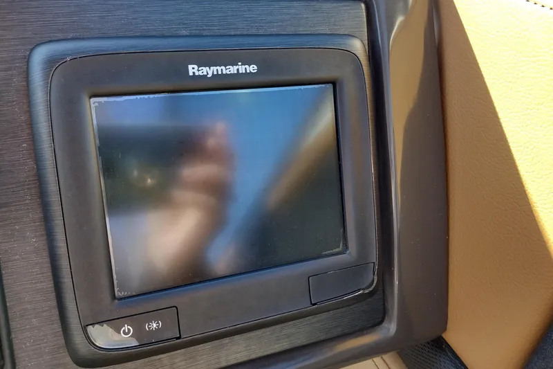 Slide: The Image of Raymarine display on 2014 Sea Ray 270 SLX boat dashboard. - 12