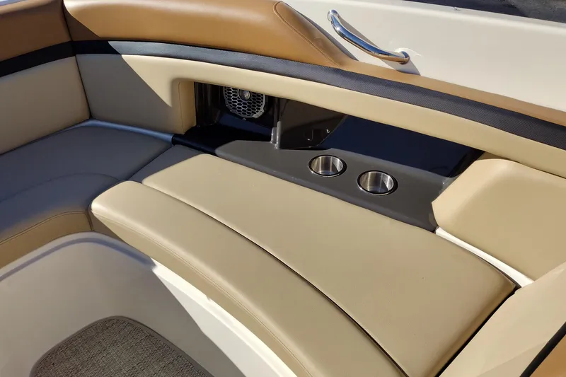 Slide: The Image of Luxurious seating area on a 2014 Sea Ray 270 SLX boat with cup holders. - 21