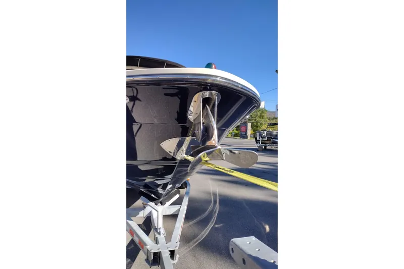 Slide: The Image of 2014 Sea Ray 270 SLX boat on trailer, showcasing anchor and bow details. - 3