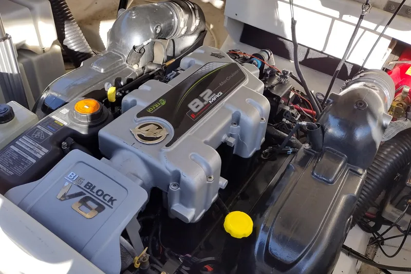 Slide: The Image of Engine of a 2014 Sea Ray 270 SLX boat, featuring a powerful V8 motor. - 43