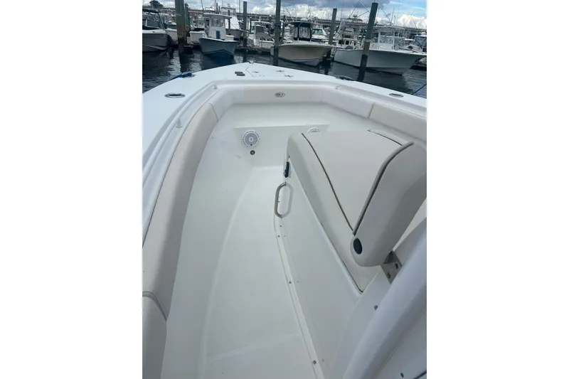 Slide: The Image of 2021 Sea Hunt Gamefish 27 Coffin Box boat interior at marina. - 13
