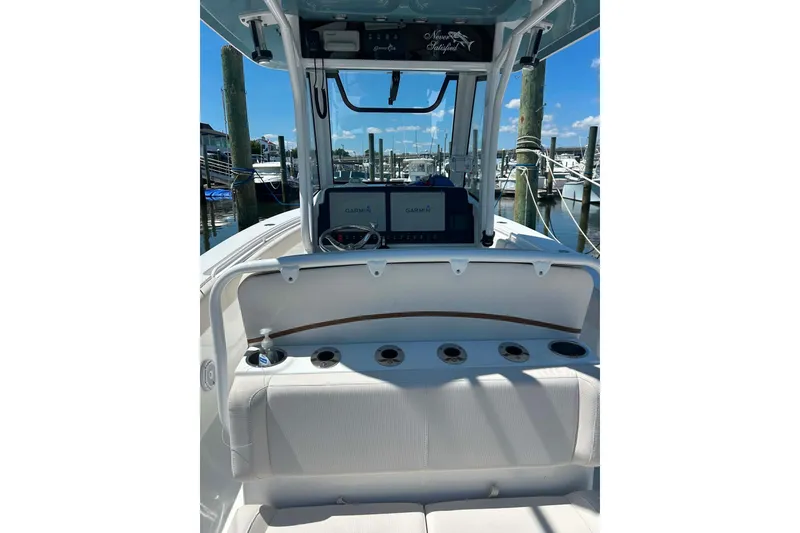 Slide: The Image of 2021 Sea Hunt Gamefish 27 Coffin Box boat interior with Garmin navigation system. - 37