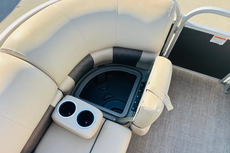 Slide: The Image of 2022 Sun Tracker Party Barge 20 DLX seating with storage and cup holders. - 14