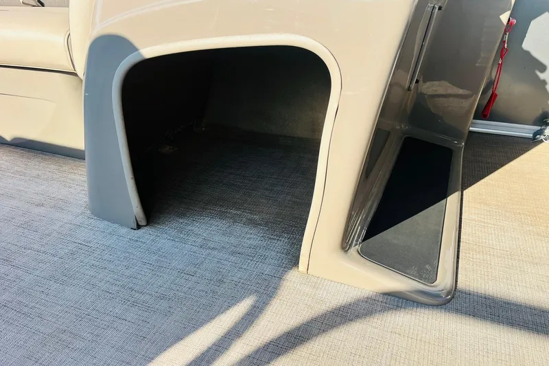 Slide: The Image of 2022 Sun Tracker Party Barge 20 DLX interior storage compartment. - 30