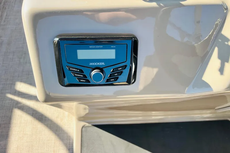 Slide: The Image of Kicker media center on 2022 Sun Tracker Party Barge 20 DLX boat console. - 32