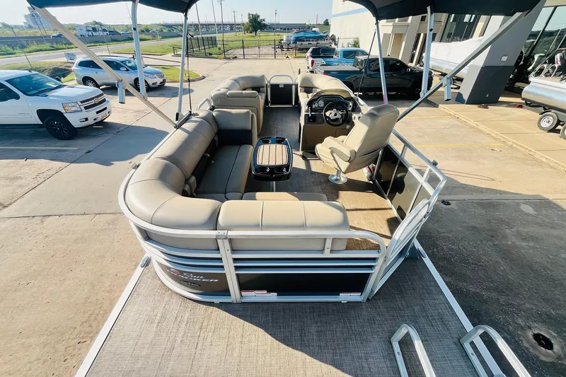 Slide: The Image of 2022 Sun Tracker Party Barge 20 DLX pontoon boat with spacious seating and modern design. - 8