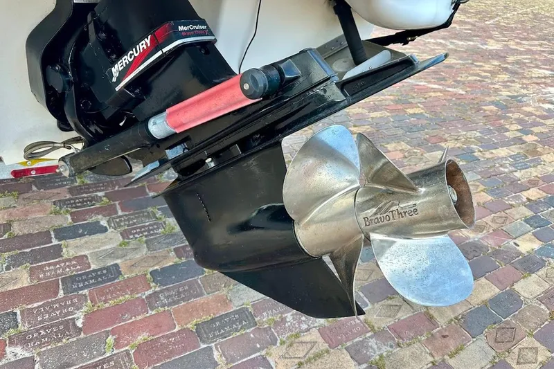 Slide: The Image of Close-up of a 2004 Sea Ray 270 Sundeck's Mercury Bravo Three propeller. - 14